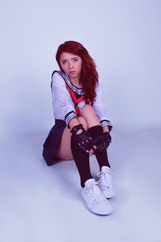 cosplay-female-japanese-school-girl-uniform-sitting-597701.jpg