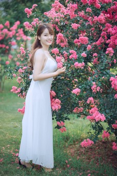 woman-in-dress-standing-beside-tree-1406764.jpg