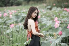 woman-wearing-brown-top-and-black-skirt-in-the-middle-of-1289401.jpg