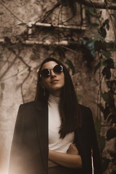 portrait-photo-of-woman-in-black-sunglasses-and-black-coat-2873702.jpg