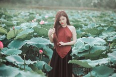 woman-in-red-halter-top-standing-in-farm-field-1386606.jpg