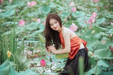 woman-surrounded-by-flowers-1322125(1).jpg