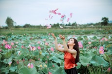 woman-throwing-pink-petals-1322136.jpg