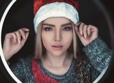 photo-of-woman-wearing-santa-hat-2755609.jpg