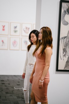 two-women-standing-inside-museum-1429521.jpg