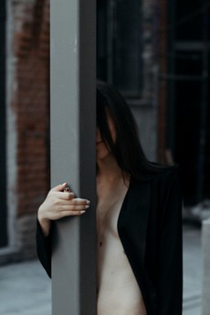 woman-standing-near-post-1987184.jpg
