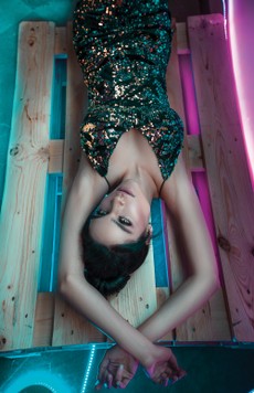 photo-of-woman-lying-on-wooden-crate-2587391.jpg