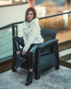 photo-of-woman-sitting-near-handrails-3061836.jpg