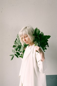 photography-of-a-woman-holding-green-leaves-1071162.jpg