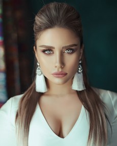 portrait-photo-of-beautiful-woman-in-white-v-neck-top-posing-2625122.jpg