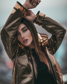 selective-focus-photo-of-woman-clear-raincoat-posing-with-2661982.jpg