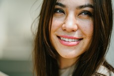 smiling-woman-wearing-white-top-1399288.jpg