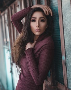 woman-in-brown-top-leaning-on-wall-2760247.jpg