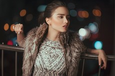 woman-leaning-on-railing-2681663.jpg