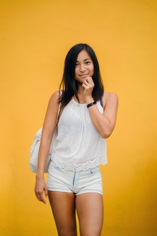 woman-wearing-white-sleeveless-shirt-and-white-denim-shorts-1082962.jpg