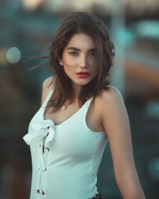 women-wearing-white-tank-top-posing-for-a-photo-2836486.jpg