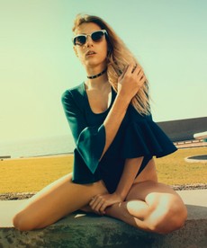 woman-wearing-sunglasses-and-blue-blouse-during-photography-821409.jpg