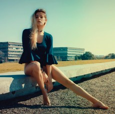 woman-wears-black-scoop-neck-long-sleeved-blouse-seats-on-821416.jpg